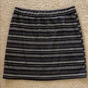 Black print mini skirt